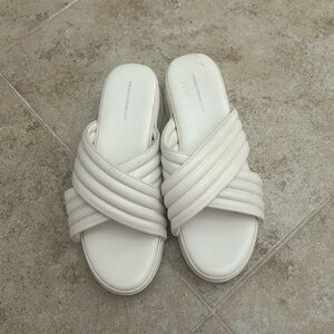 Never worn, white wedge sandals.